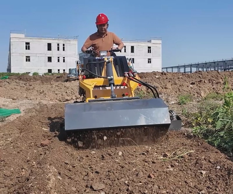 Mini skid steer rotary tiller