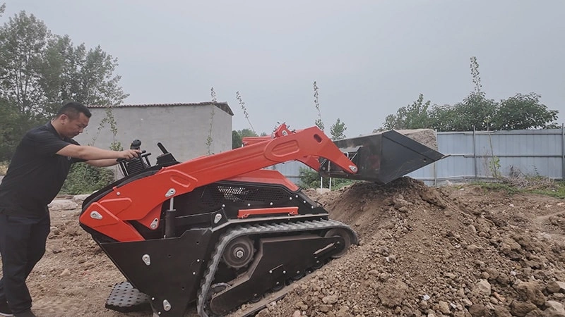 skid steer bucket performing material handling under stable hydraulic load