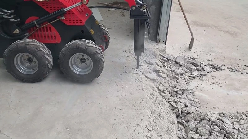 hydraulic breaker attachment operating under variable hydraulic load conditions